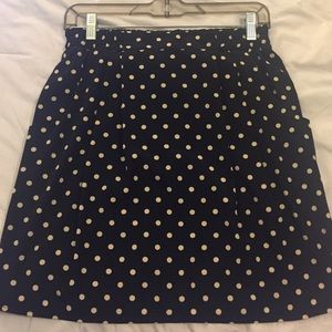 Black polka dot mini skirt