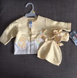 Brand new sweater, socks and hat