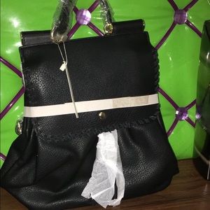 Leather back pack bag/ shoulder and holding hands