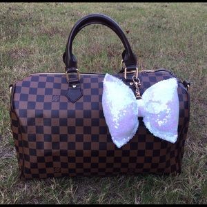 White Iridescent Sequin Bow Charm Bag Jewelry