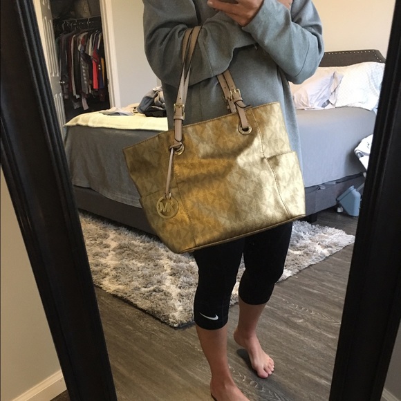 Authentic MK gold purse