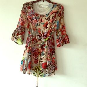 Unique blouse feature with above waist