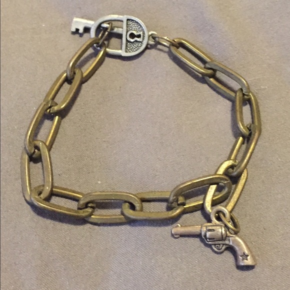 Handmade brass bracelet. Lock and key closure