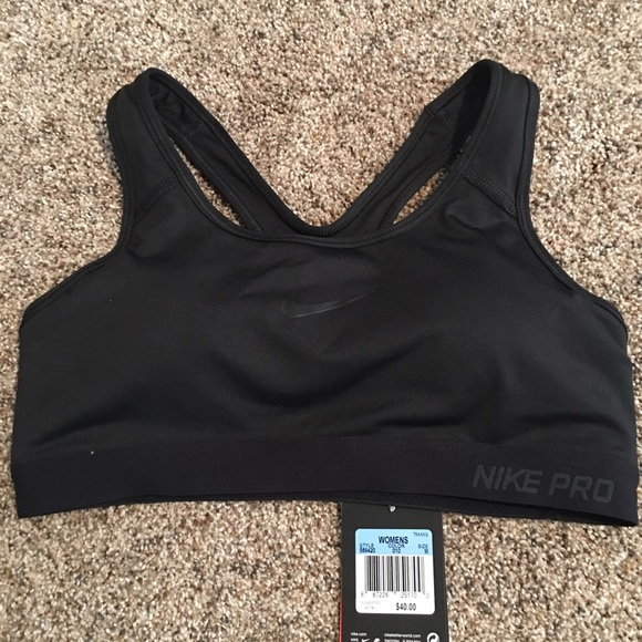 Nike sports bra, never worn, new with tags.