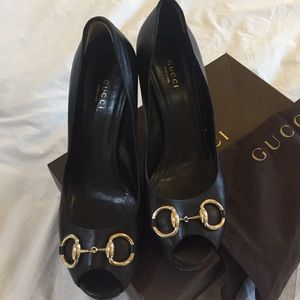 Gucci black leather with gold buckle platform heal