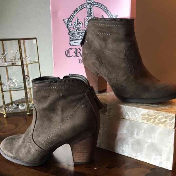 Dark brown sued boots.
