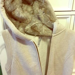 Women's tan vest with fur hood