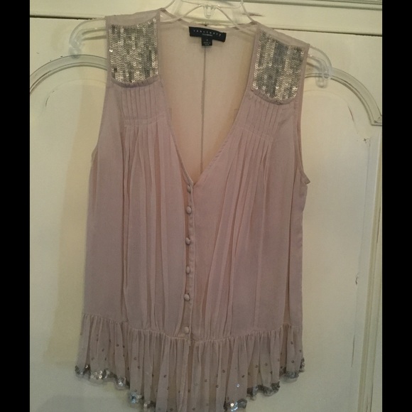 Sleeveless sequined peplum top