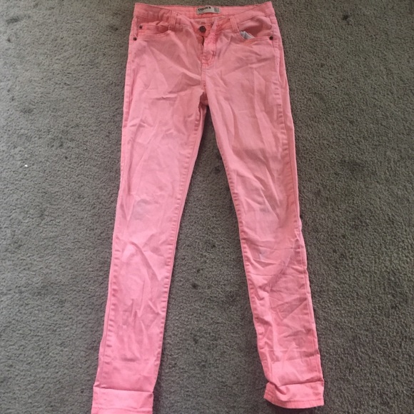 Salmon colored jeans