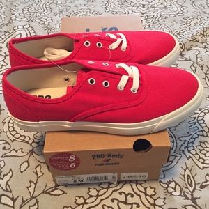 Brand new, red and white Keds sneakers