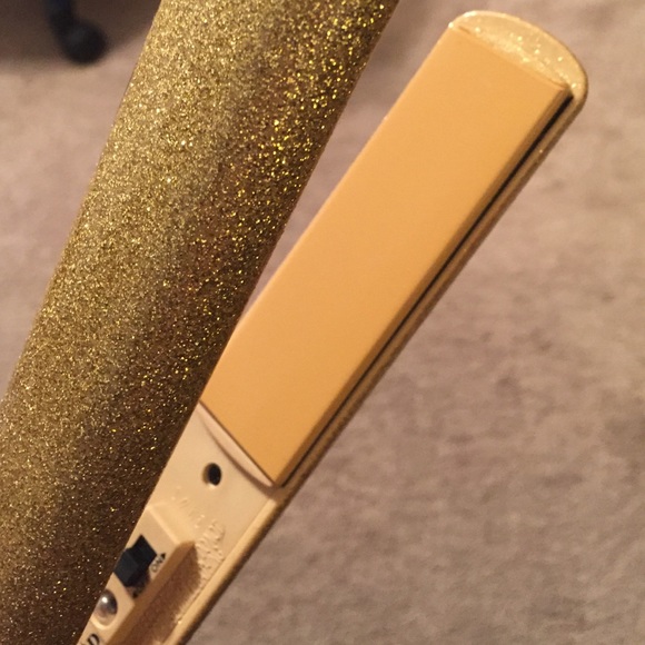 never used gold sparkled chi hair straightener.