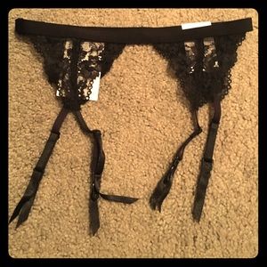 Brand NWT black garter belt H & M