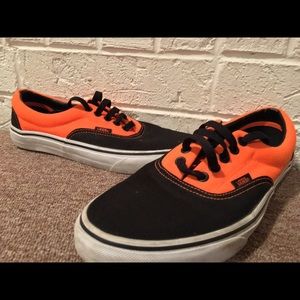 Black and orange Vans