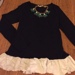 Navy blue blouse with white ruffled bottomed