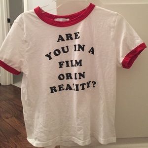 zara "are you in a film or in reality?" tee