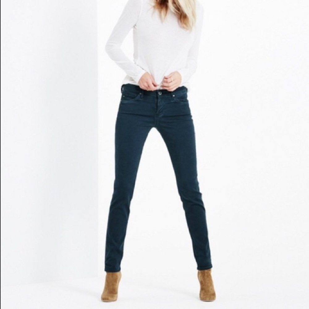 Blue/green skinny pant with silver accents.