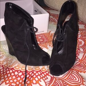Also open toed black suede shoes with wedge