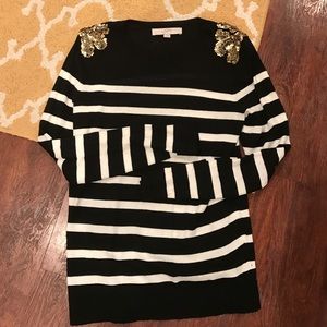 Black and white striped holiday sweater