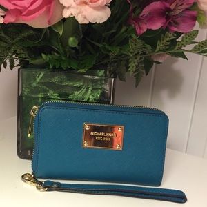Michael Kors Blue wristlet and iPhone 5 holder