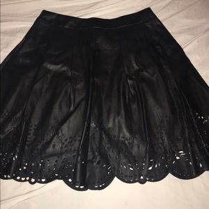 Eci black faux leather cutout skirt