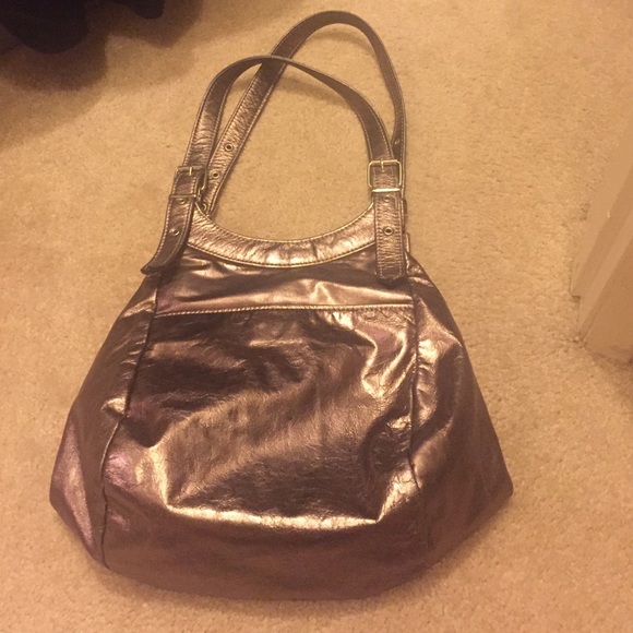 Used purse, metallic medium size