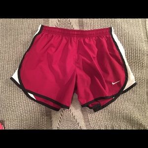 Nike burgundy and white shorts