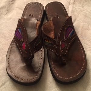 Brand new never worn ladies slip on sandals.
