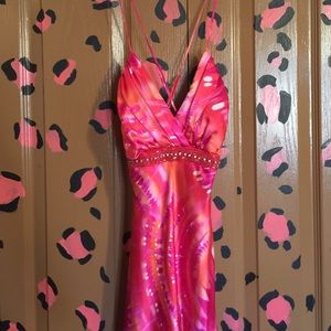 Long, pink/orange colored dress