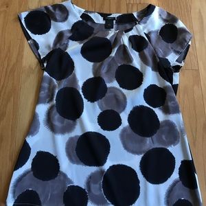 Black, grey, and white blouse