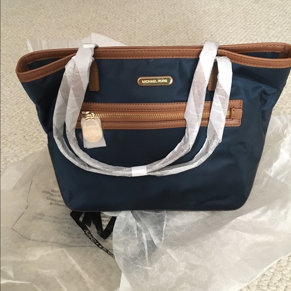 Michael Kors Blue nylon bag.  NWT