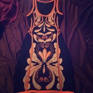 Black and orange Bebe dress new.