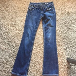 Miss Me back black fleur pocket jeans.