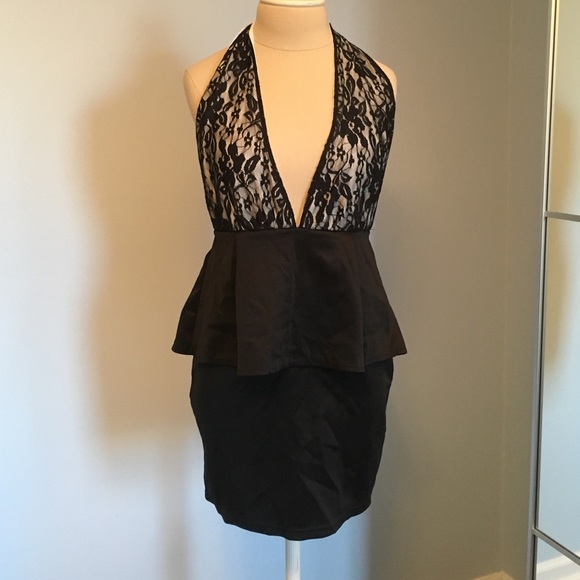Dresses & Skirts - Backless lace peplum dress never worn