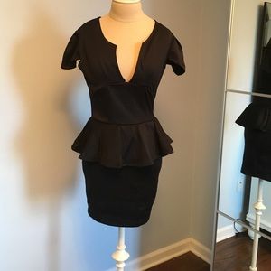 Peplum black dress never worn super flattering
