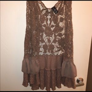 Gorgeous lace over piece from buckle.