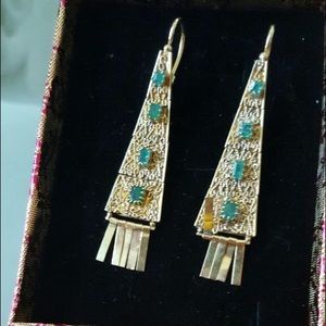 Pure gold and genuine emerald earrings.