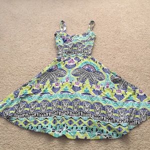 Aeropostale floral dress with open back.