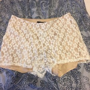 Nude white lace shorts