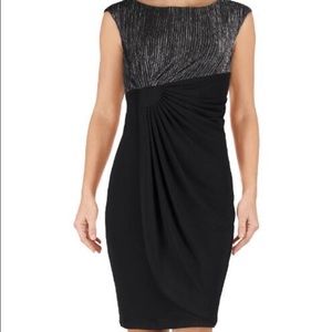 Black ruffled dress with silver top lining