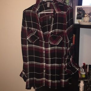 Plaid, button up shirt.