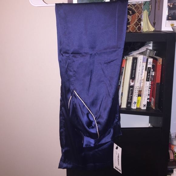 Blue satin pants.