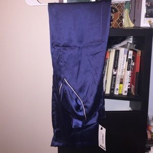 Blue satin pants.