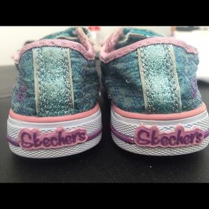 Skechers Twinkle Toes shoes!  Size 7.  Well loved