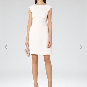 Reiss White dress with lace top inlet.