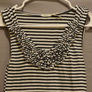 Black and white striped top with ruffle detail