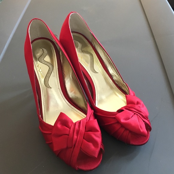 Red peep toe pumps