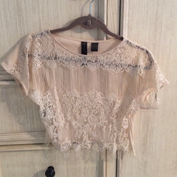 Cream colored lace and fringe blouse
