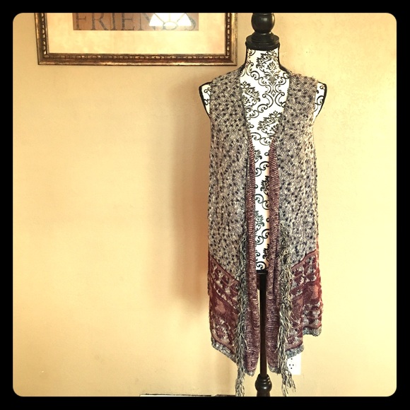 Super cute sleeveless shrug!