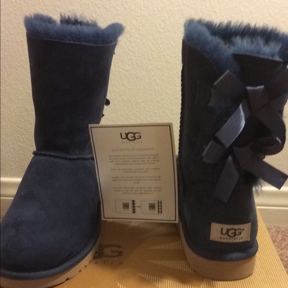 brand New Ugg short navy boot  with bows size 7