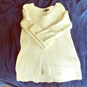 Cream colored sweater. Never been worn before.